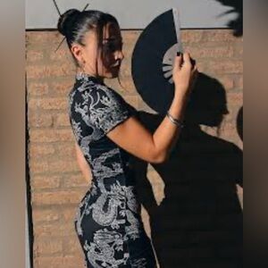 Popular 21 Black and White Bodycon Midi Dress with Mock Neck